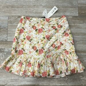 Zara floral skirt with ruffle, cinching, and bow